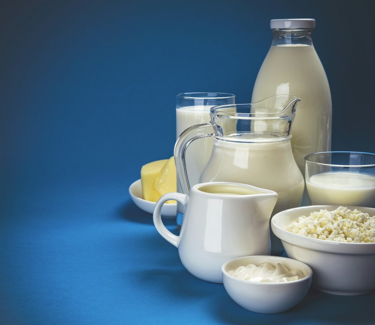 dairy-products-on-blue-wooden-background.jpg